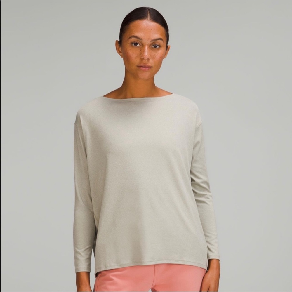 Lululemon back in action long sleeve. Light cream/tan color.